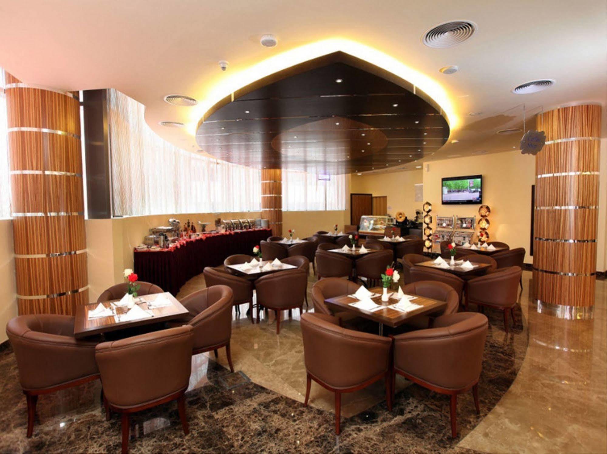 Xclusive Maples Hotel Apartment Dubai Restoran gambar